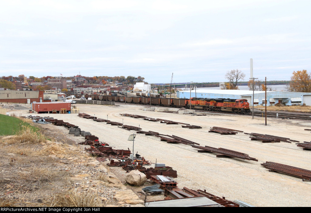 About to get on the Hannibal Sub, C-NRMOPP rolls through the yard and MOW staging area